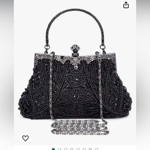 Women’s vintage style evening clutch bag with chain